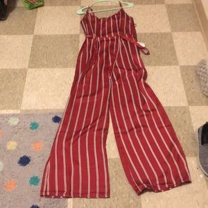 A red black and white striped jumpsuit